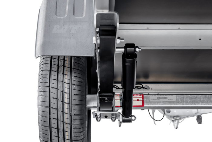 Einachsiger Anhänger auf Blattfedern mit Aluminiumseitenwänden 200x125 Unitrailer Garden 201/R KIPP ALU mit H-0-Rahmen und grauer Plane
