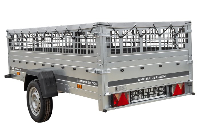 Einachsiger Anhänger auf Blattfedern 264x125 UNITRAILER GARDEN 264/R KIPP mit Gitterseitenwänden, H-0-Rahmen und grauer Plane